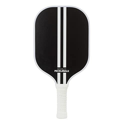 Black pickleball paddle with white stripes and handle.