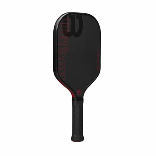 Black pickleball paddle with red accents