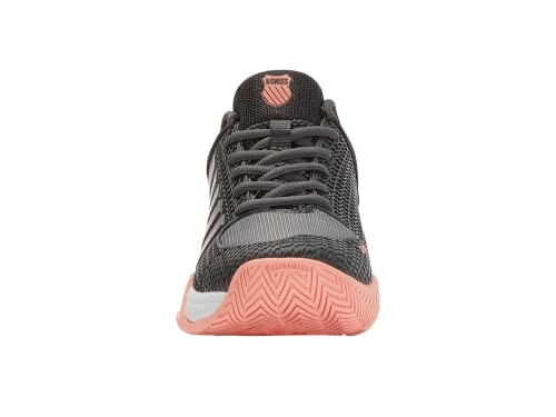 Front view of a black and pink sneaker