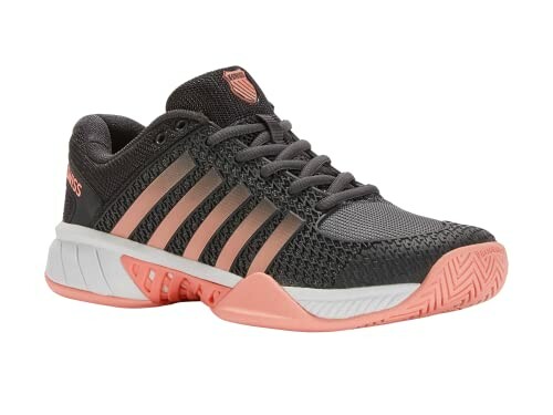 Black and pink tennis shoe with striped design.