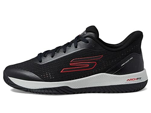 Black athletic sneaker with red logo and arch fit design