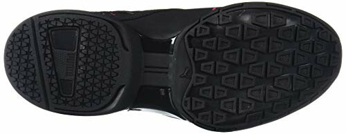 Black sneaker sole with geometric tread pattern, perfect for traction on various surfaces