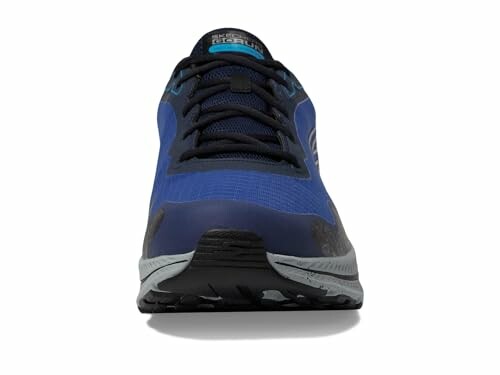 Front view of a blue running shoe