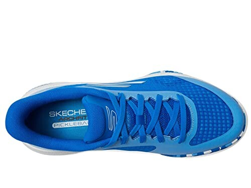 Top view of a blue Skechers sport shoe with laces.