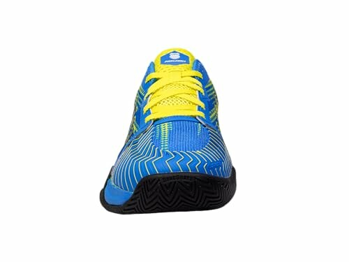 Front view of a blue and yellow sports shoe.