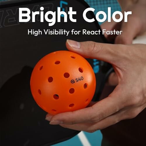 Hand holding an orange pickleball with text 'Bright Color, High Visibility for React Faster'.