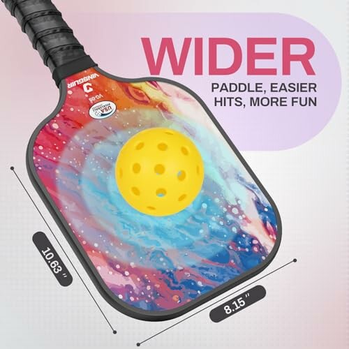 Colorful pickleball paddle with yellow ball on it.