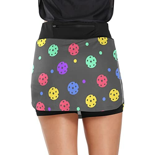 Skirt with colorful polka dots on a gray background