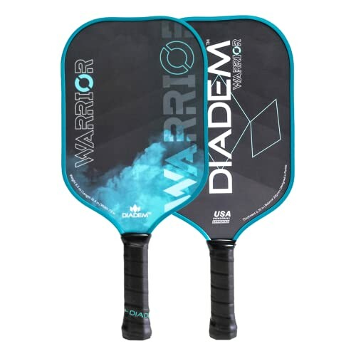 Two Diadem Warrior pickleball paddles with black and teal design