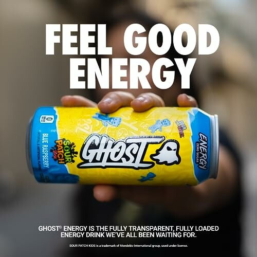 Person holding Ghost energy drink can with feel good energy text.