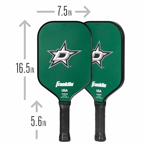 Two green pickleball paddles with measurements