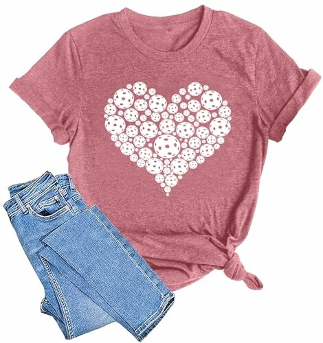 Pink t-shirt with heart pattern paired with jeans