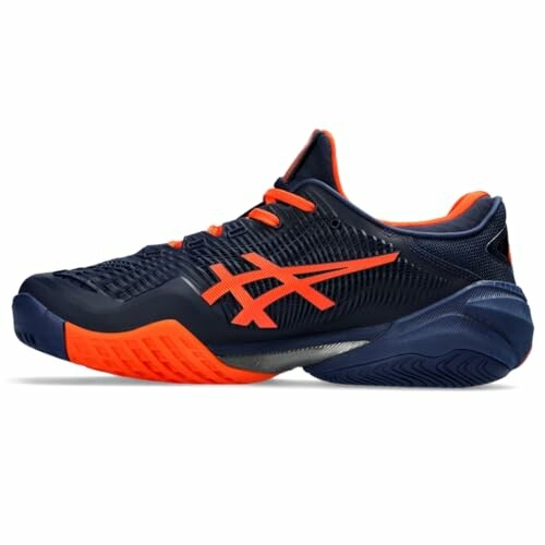 Navy and orange sports shoe with dynamic design