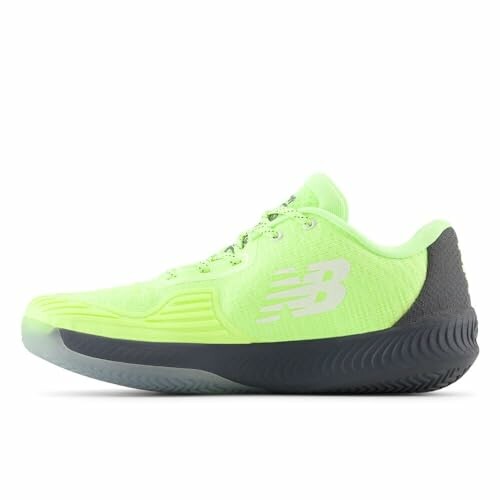 A bright green pickleball shoe with a black sole, showcasing its unique design and style.