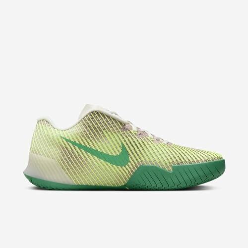 Green Nike tennis shoe with a sleek design