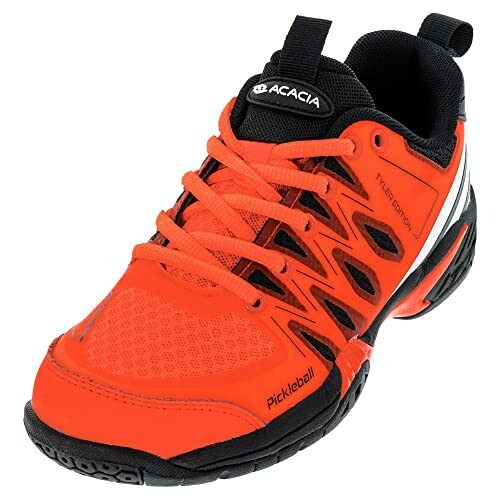 Orange pickleball shoe with black accents.