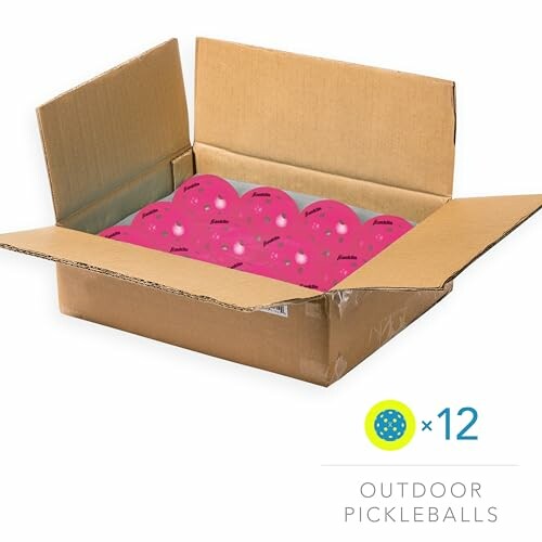 Open box with 12 pink outdoor pickleballs.