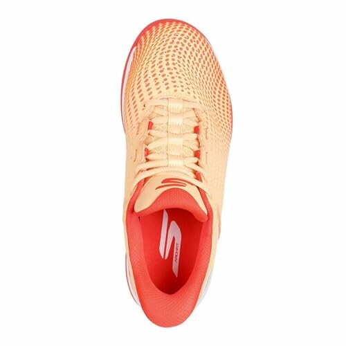 Top view of a peach and orange athletic shoe