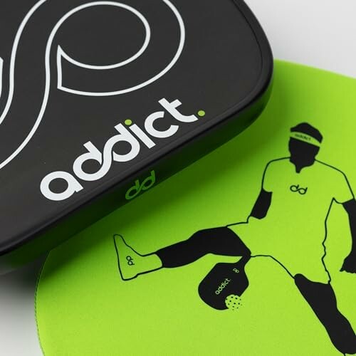 Pickleball paddle case and player illustration on green surface.