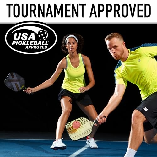 Two pickleball players in action on the court, USA Pickleball approved.