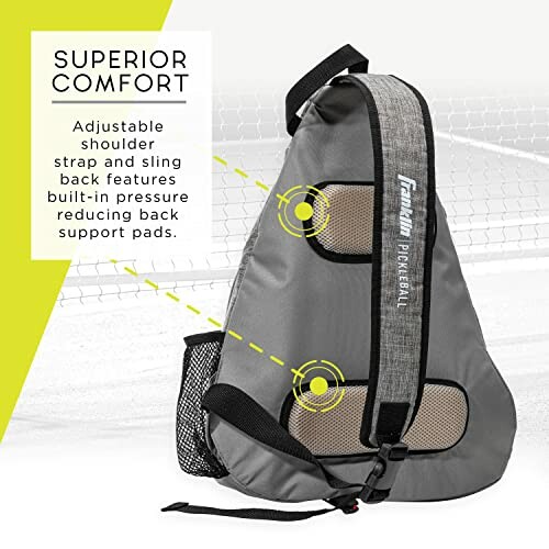 Gray pickleball sling backpack with adjustable strap and pressure-reducing padding.