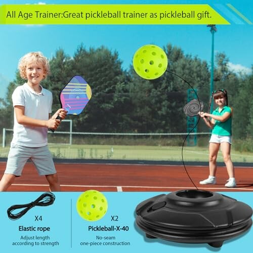 Children playing with a pickleball trainer set on a tennis court.