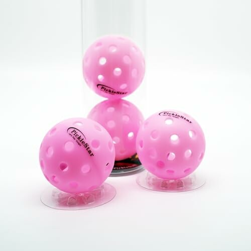 Pink pickleball set with balls and container