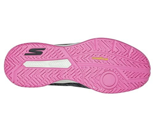 Pink sneaker sole with Goodyear branding.