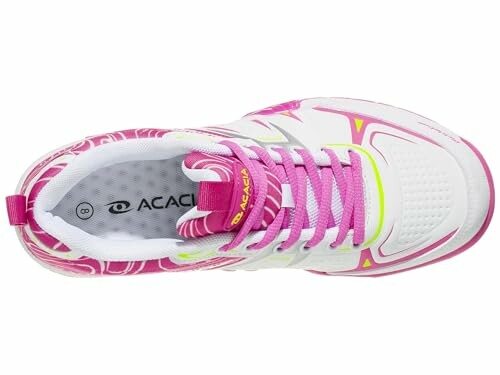 Top view of a pink and white sneaker with laces.