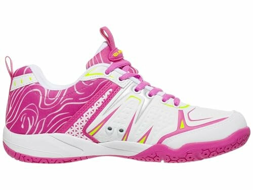 Pink and white sports shoe with vibrant design