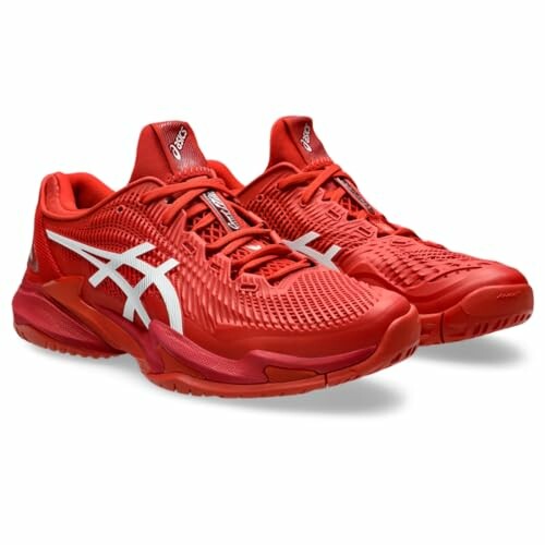 Red Asics Gel Resolution 9 tennis shoes with white accents.