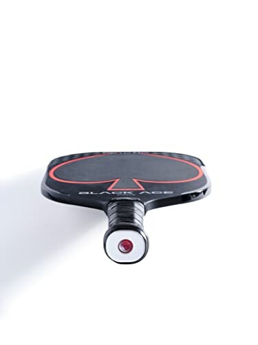 Black and red table tennis paddle with a unique design