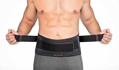 Person wearing a black waist support belt.