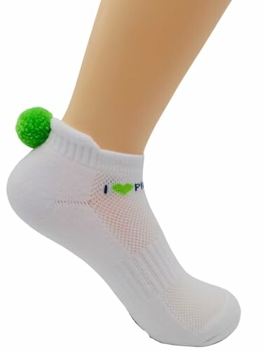 White ankle sock with green pompom on heel