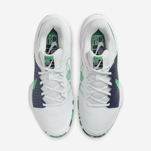 Top view of white and green sneakers with black accents.