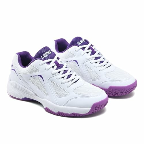 White and purple sports shoes with mesh design.)/>
  <p>The Women's Pickleball Shoes - AMZ-P601 is designed to provide a comfortable and supportive fit for women's pickleball players. With its sleek design and cutting-edge technology, this shoe is sure to revolutionize your game and keep you ahead of the competition.</p>
  <p>Whether you're looking to improve your speed, agility, or endurance, these shoes have got you covered. The shoe's breathable design allows for enhanced airflow and moisture management, keeping your feet cool and dry even during the most intense matches.</p>
  <p>Check out our <a href=