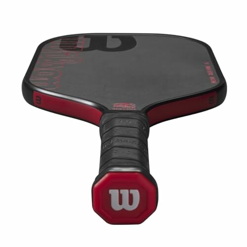 Wilson pickleball paddle with black and red design