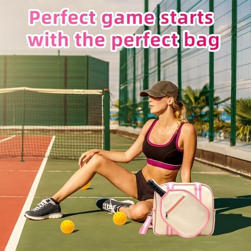 Woman sitting on tennis court with sports bag and balls.