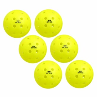 Six yellow perforated plastic balls