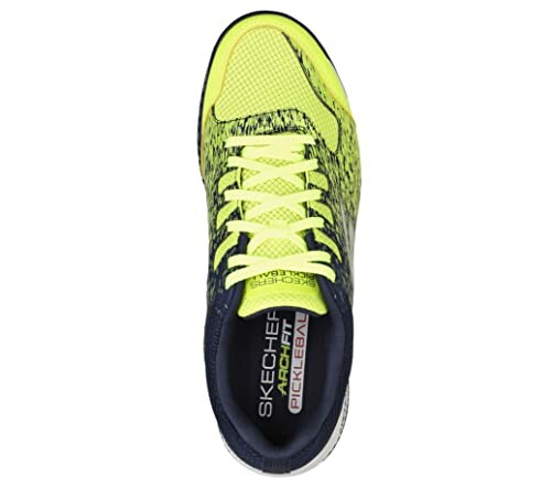 Top view of a yellow Skechers pickleball shoe.